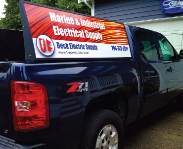 Beck Electric truck with Bedfin mobile billboard installed