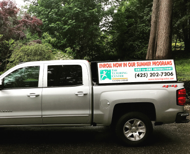 The Tutoring Center pickup truck sign to advertise a tutoring business.